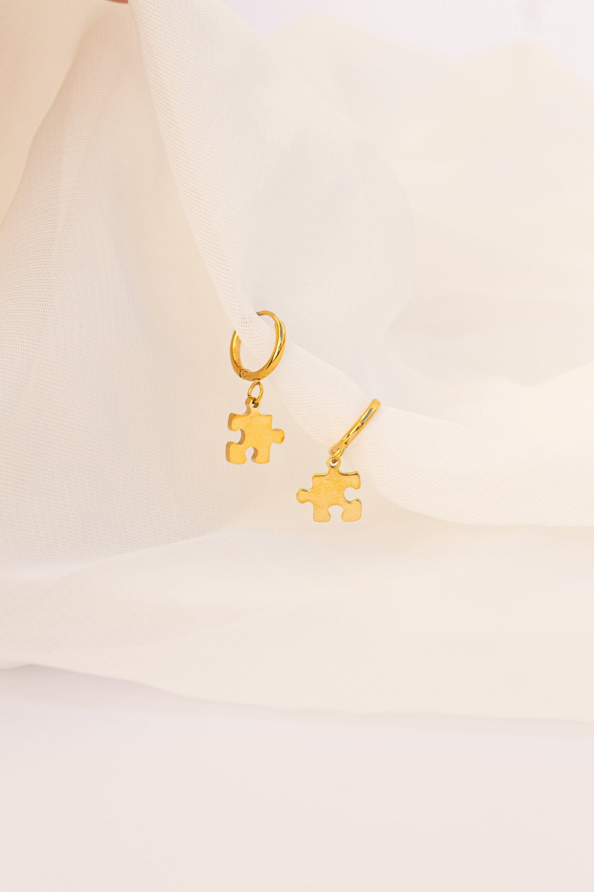 Puzzle Piece Huggie Hoops