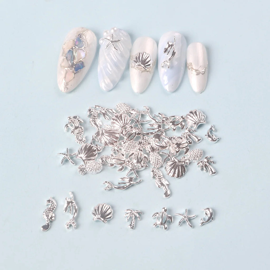 TSZS 50pcs/bag Ocean Starfish Shell Nail Art Charms Silver Beach Starfish Sea Seashell Nail Decoration Metal 3D Charms for Nail